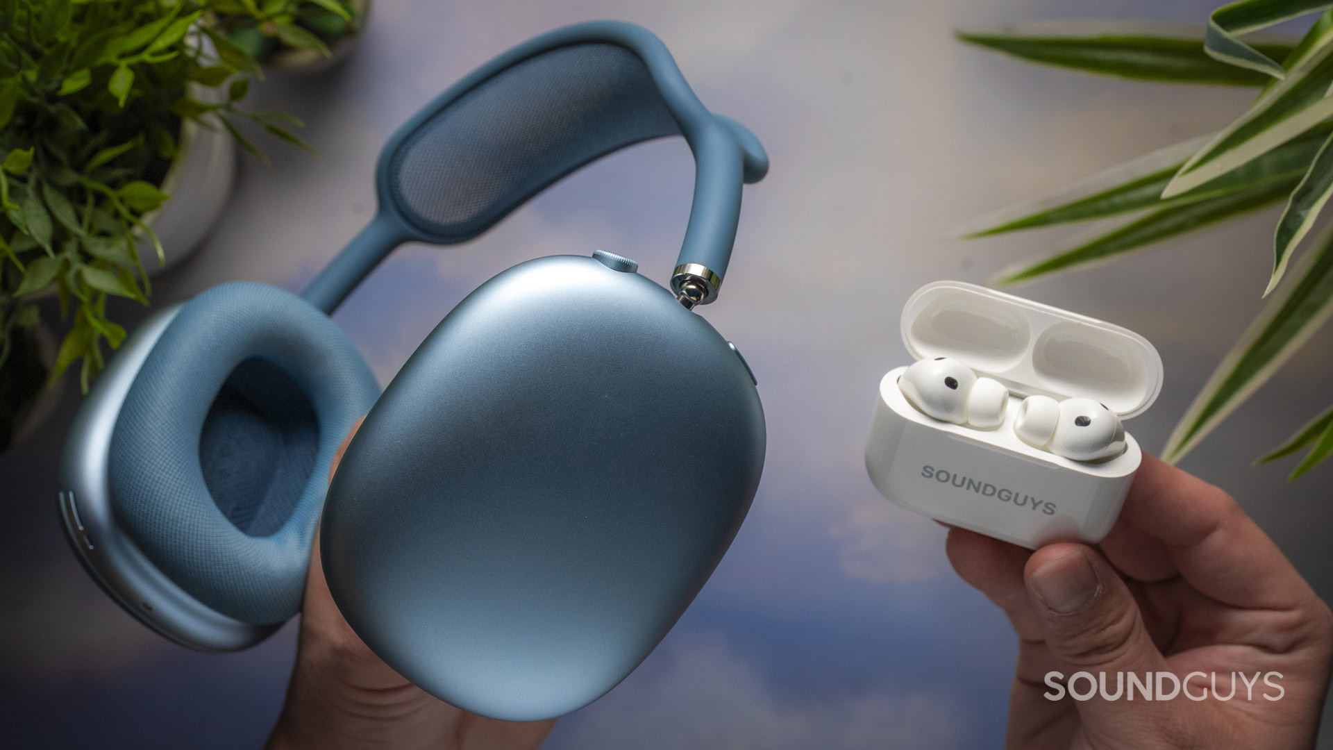 Apple AirPods Max 2 next to the open AirPods Pro 3 charging case with earbuds inside.