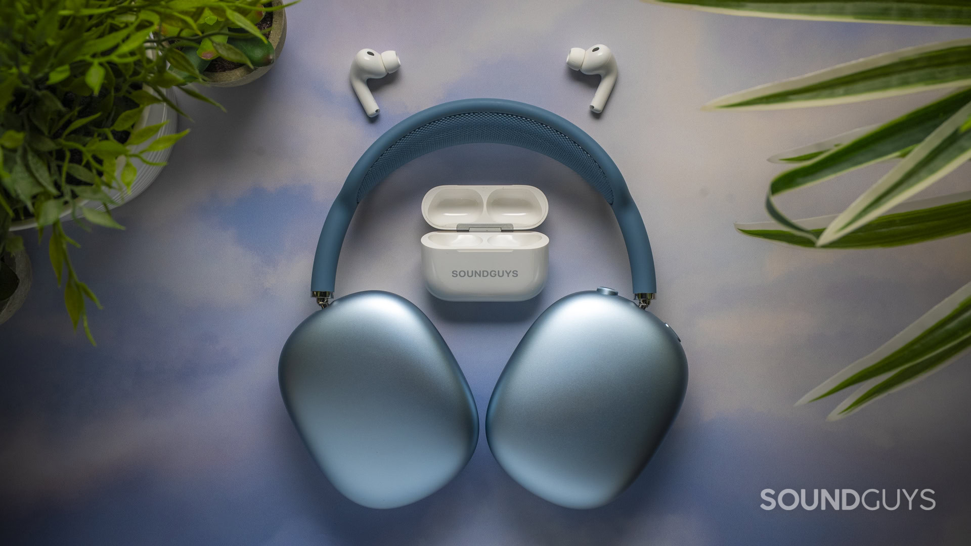 Apple AirPods Max 2 headphones with the AirPods Pro 3 earbuds and open charging case.