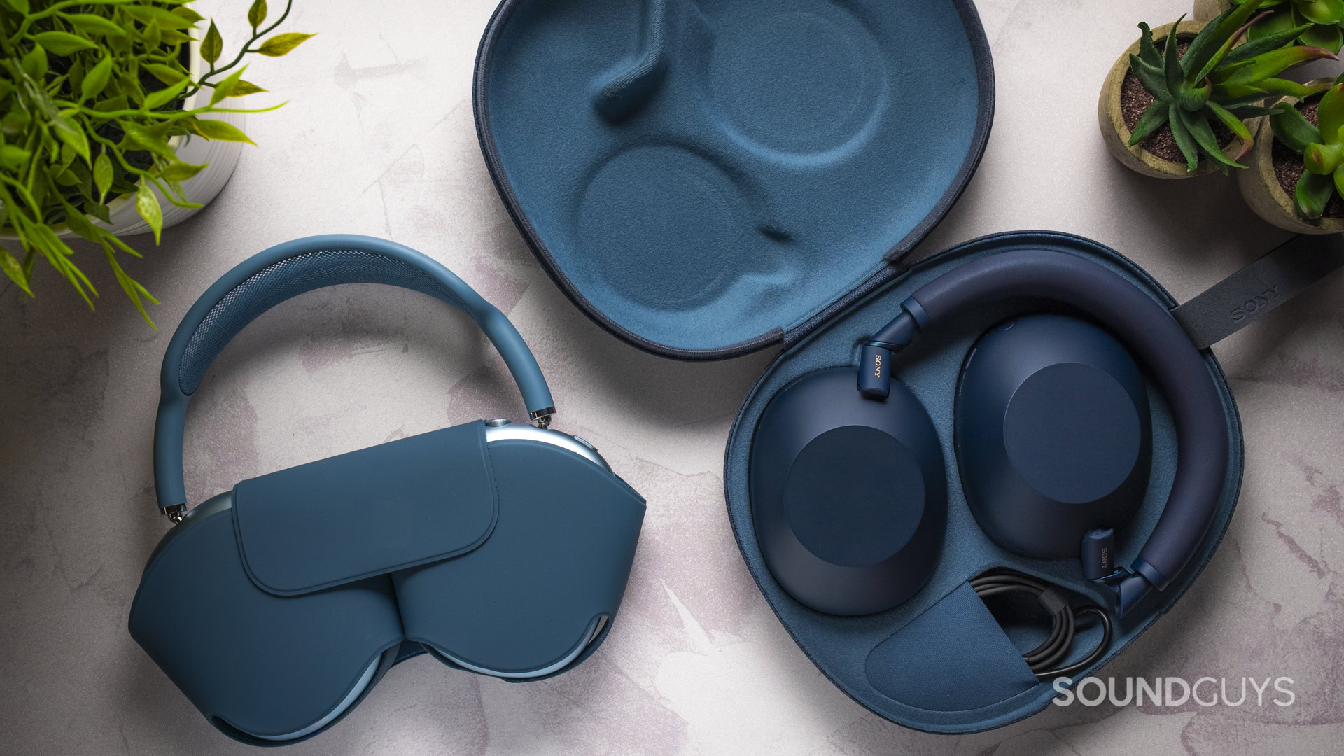 Apple AirPods Max 2 vs Sony WH-1000XM6-19 Sony WH-1000XM6 inside carrying case with cable storage compared to AirPods Max 2 Smart Case.