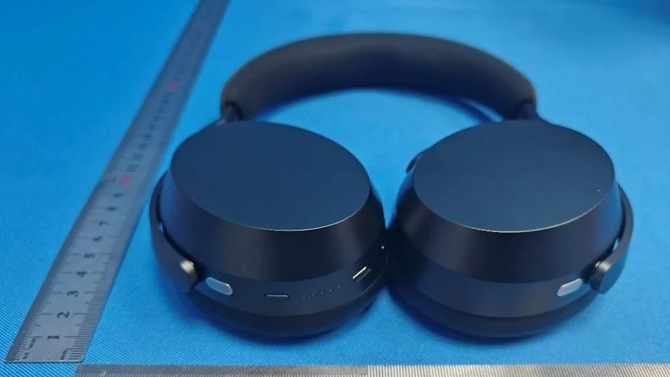Front-facing view of the leaked Sennheiser Momentum 5 wireless headphones in black, showing circular ear cups and fabric headband