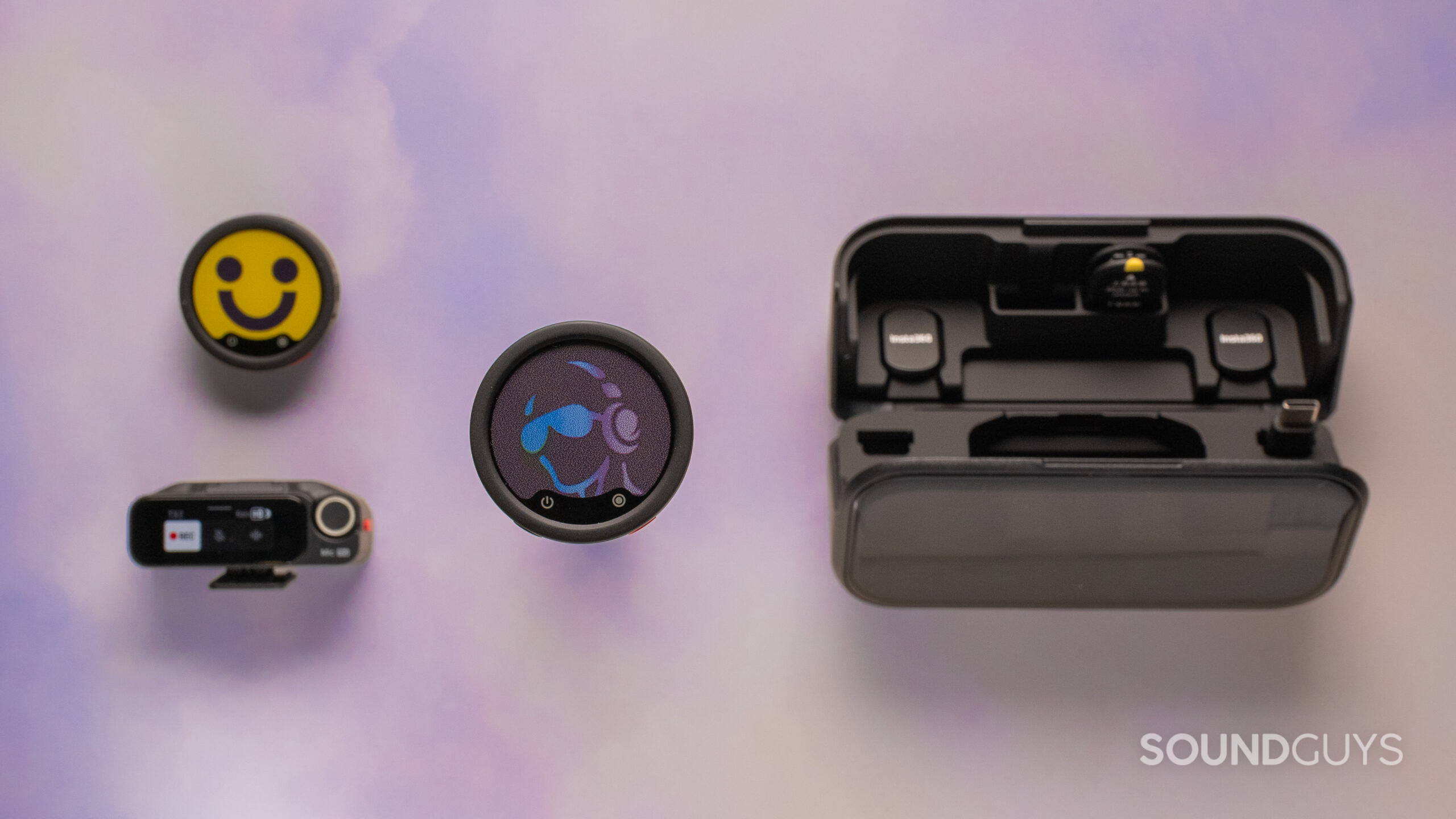 Insta360 Mic Pro Top down 2 circular wireless lav microphones the Insta360 Mic Pro with a rectagular case.
