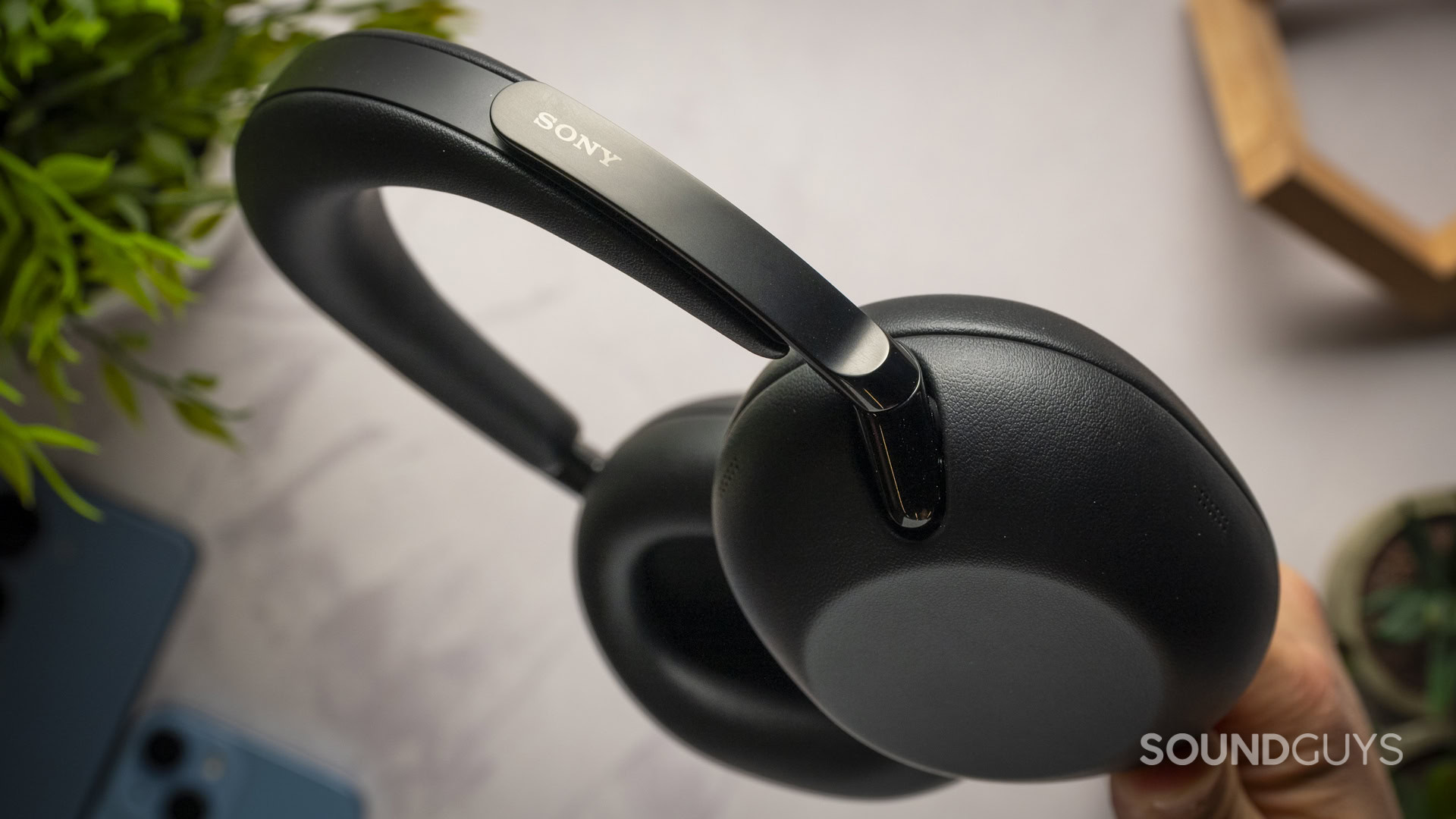 A close up of the Sony WH-1000XX the Collexion band.