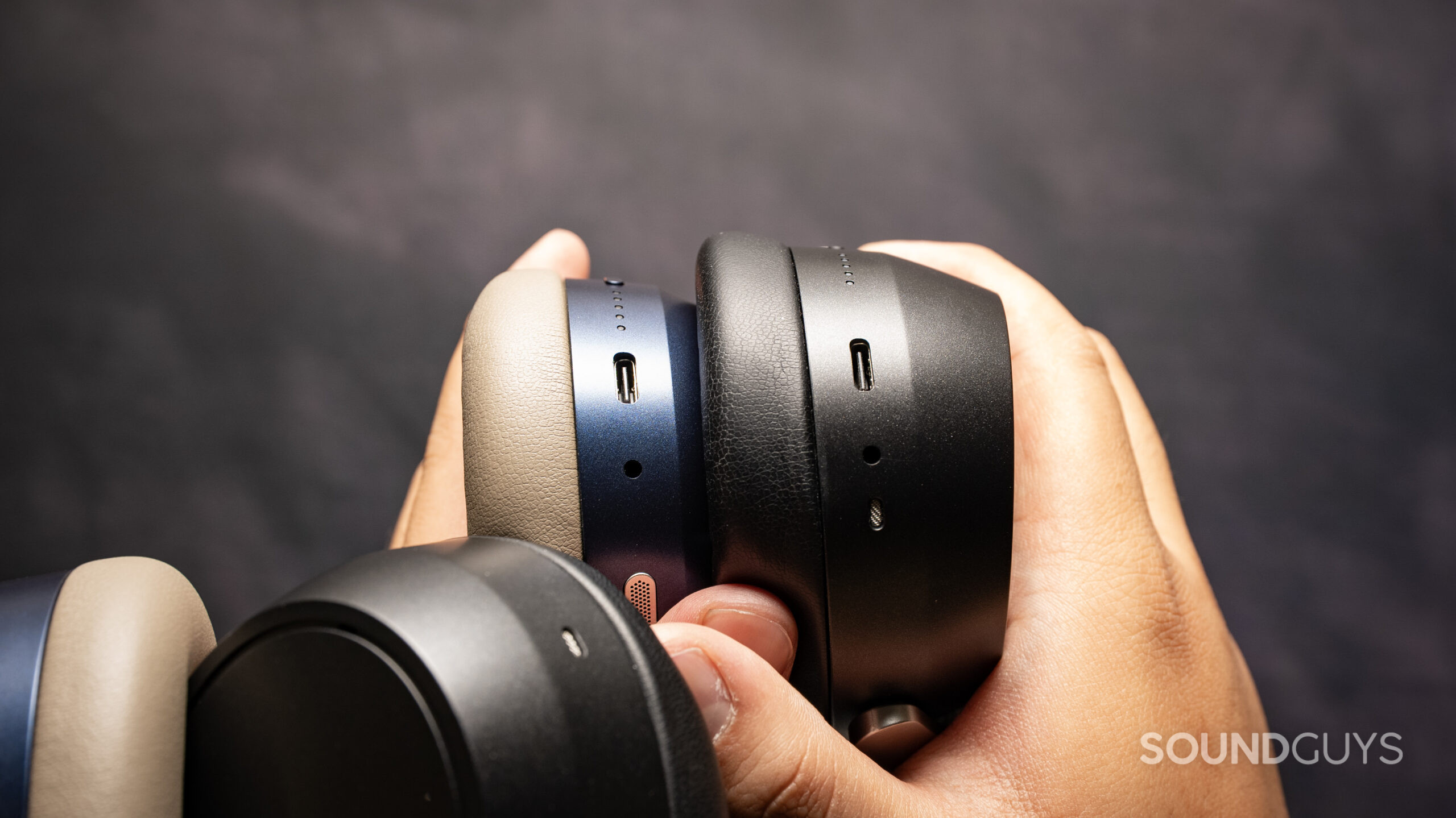 sennheiser momentum 5 wireless headphones vs. sennheiser hdb 630_ports A side-by-side photo showing the ports of the Sennheiser MOMENTUM 5 Wireless and Sennheiser HDB 630.