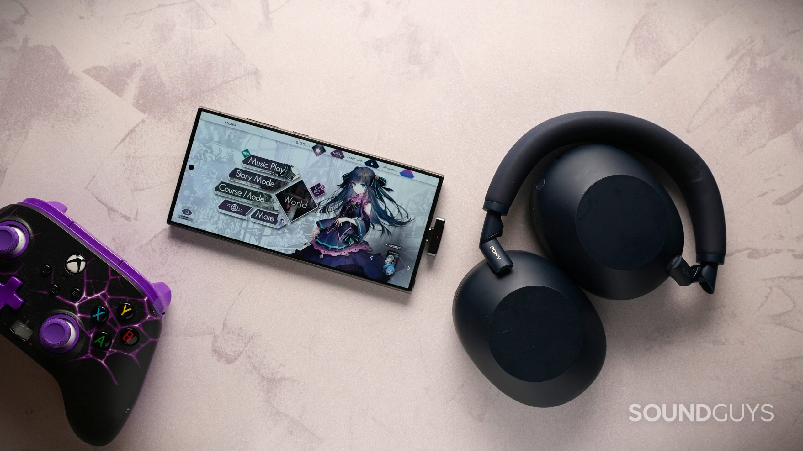 Sony XM6 headphones with game controller and a S24 Ultra with anime game on screen Sony XM6 headphones with game controller and a S24 Ultra with anime game on screen