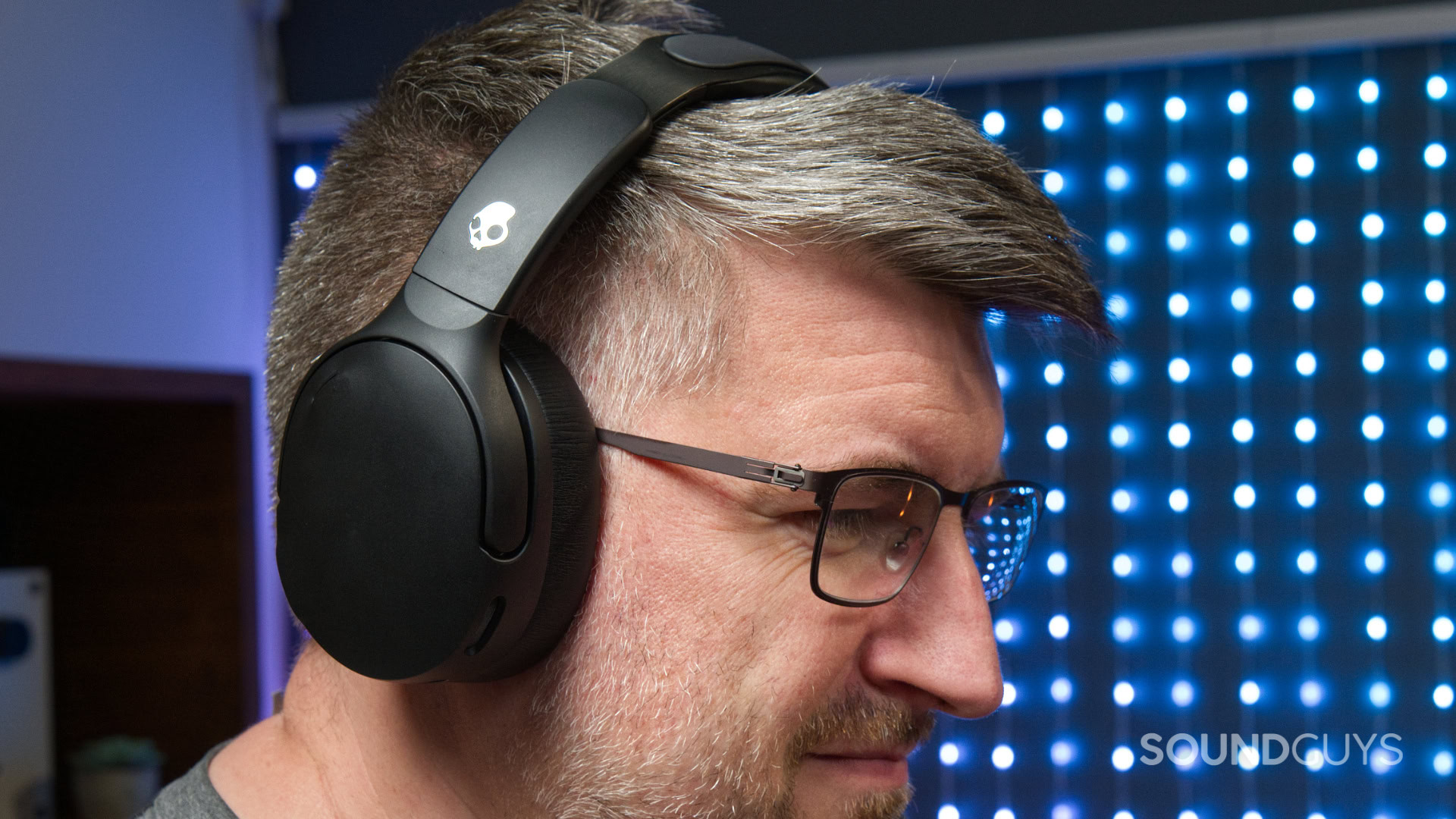 A photo of a man wearing the Skullcandy Crusher 1080 ANC.