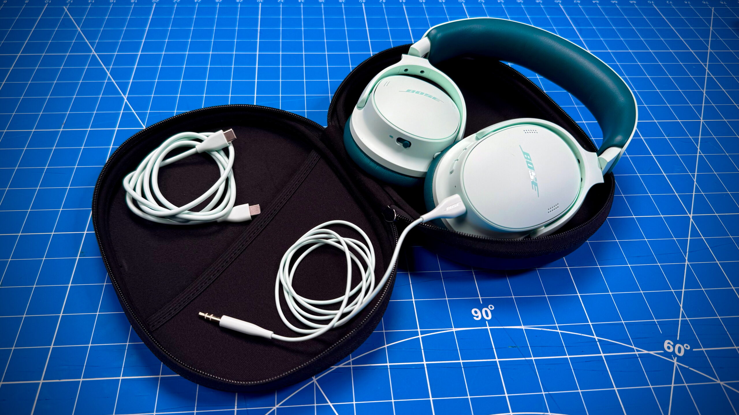 Bose QC Headphones (2nd Gen) - 1 (2) Top down photo of the Bose QuietComfort Heandphones (2nd Gen) showing its included audio cables.