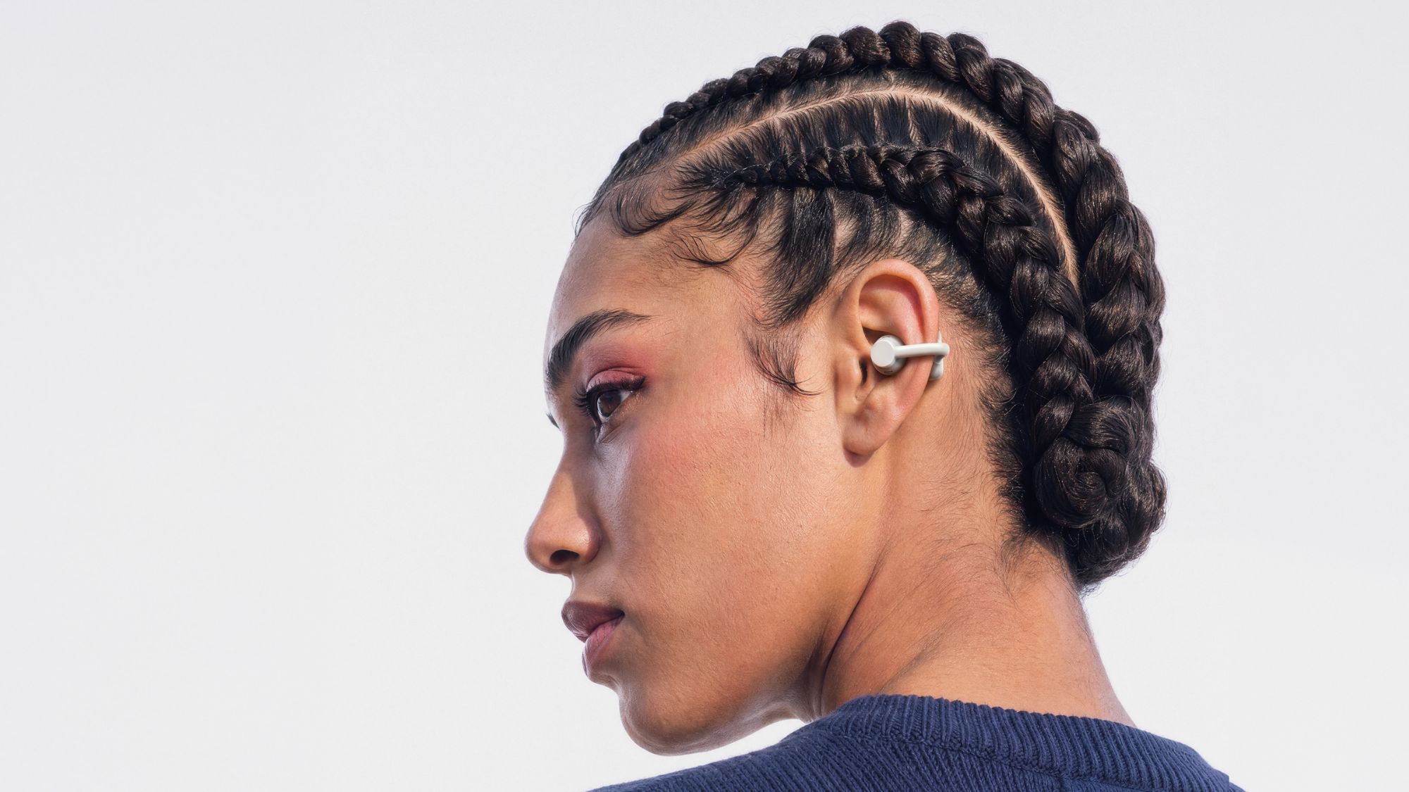 CMF Clip Pro on a person's ears