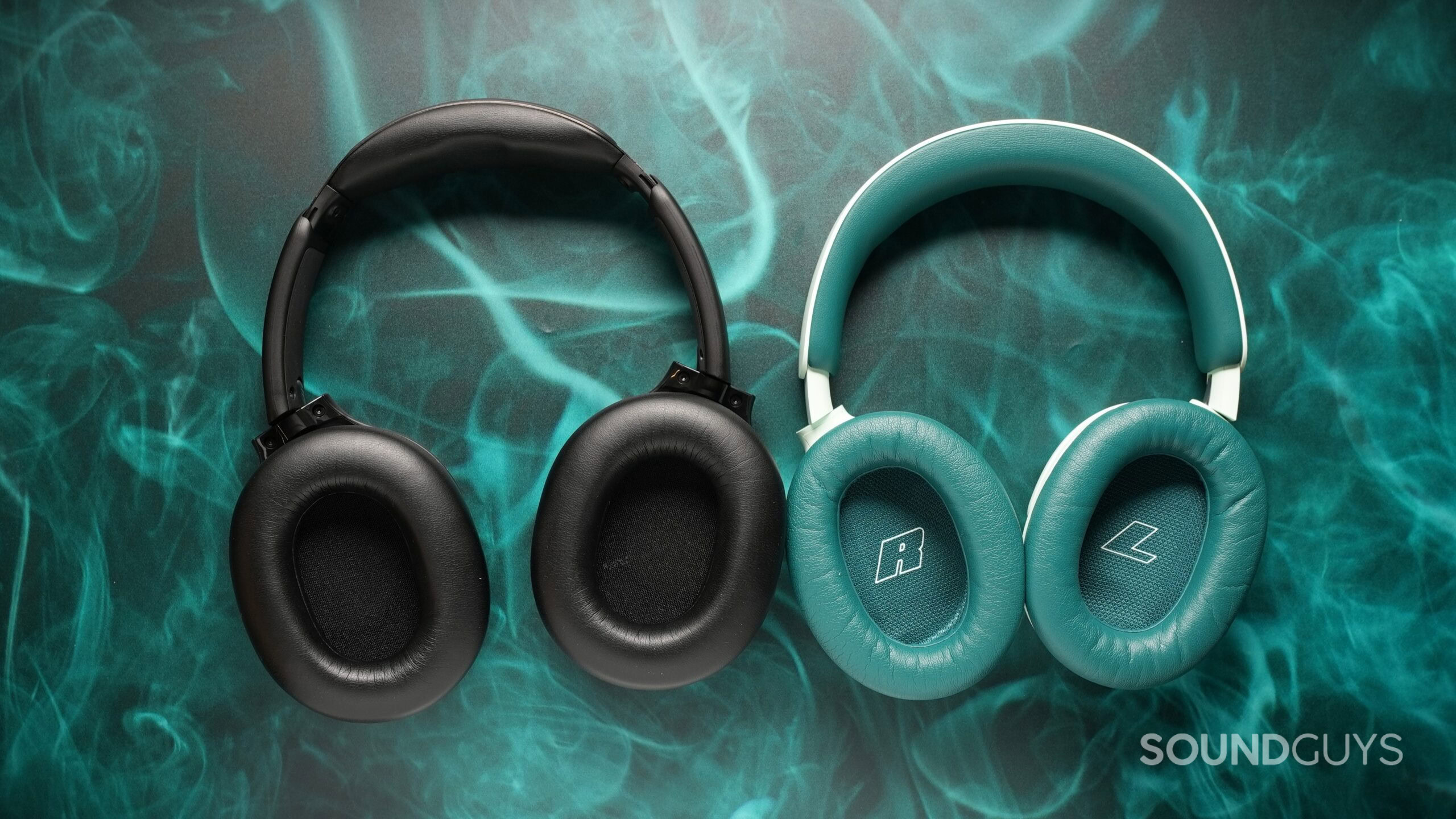 bose quietcomfort 2nd gen headphones and sckullcandy crusher 1080 anc face up on blue table mat