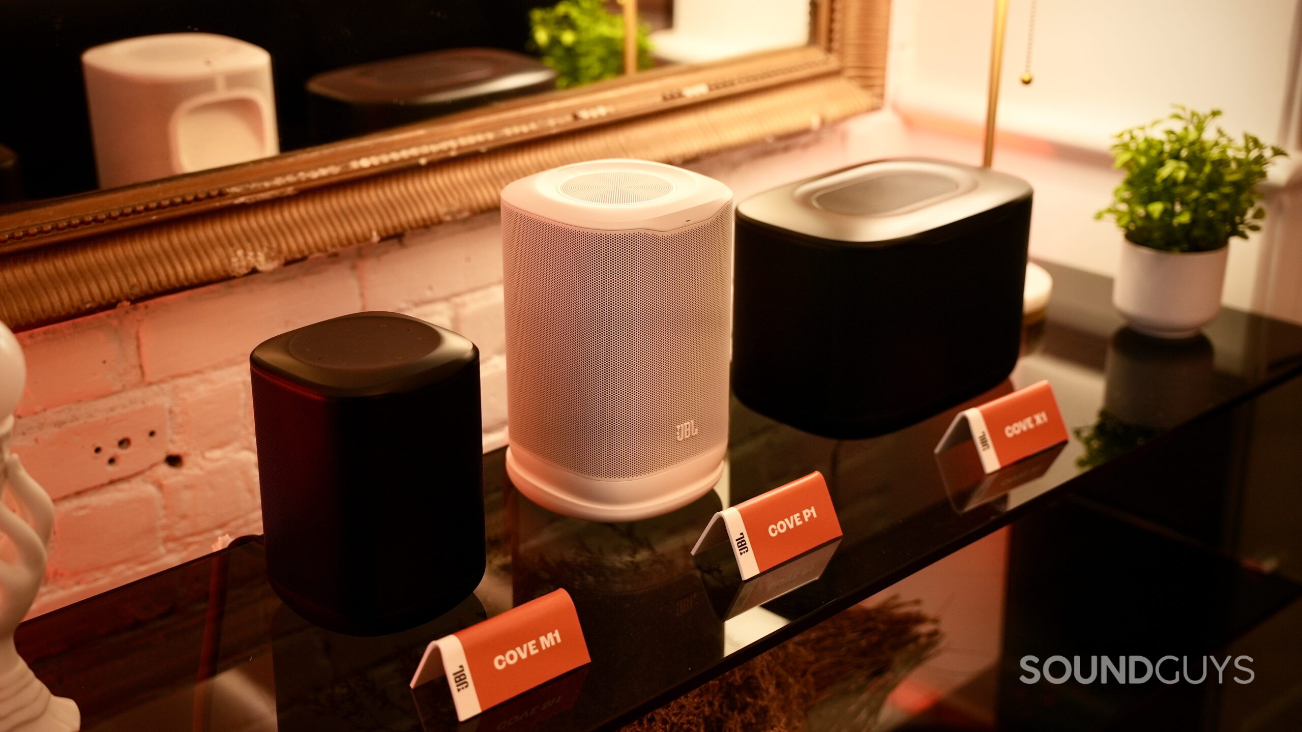 JBL Cove Series lineup shot - 1 JBL Cove M1, P1, and X1 Wi-Fi speakers displayed together in black and white.