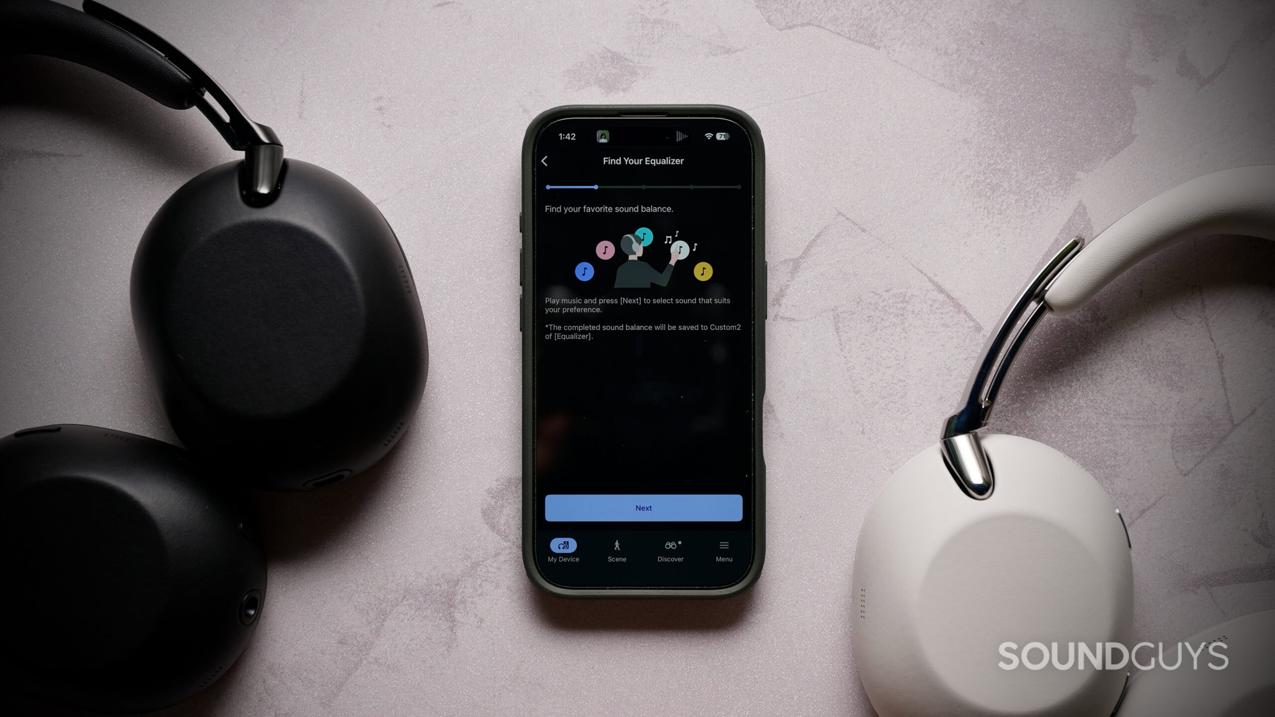 Sony WH-1000XX Find your EQ - 1 The Sony 1000X The Collexion headphones in black and white sit beside a phone showing Sony’s Find Your Equalizer feature.