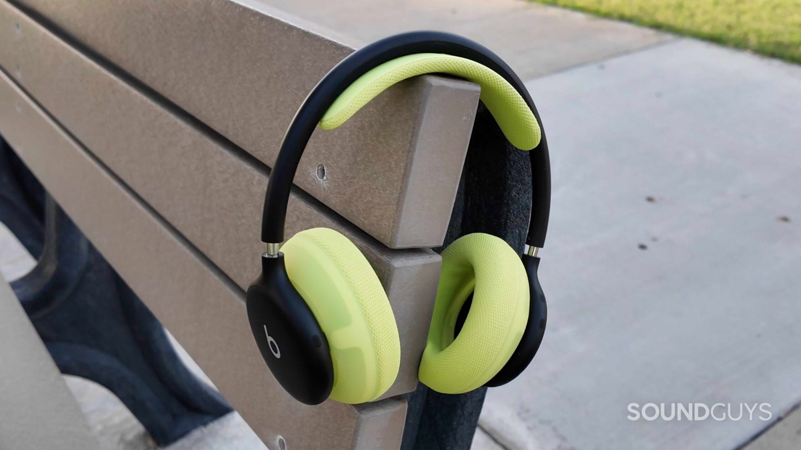 Beats-360-review-10 The Beats 360 in black and volt hanging from a bench.