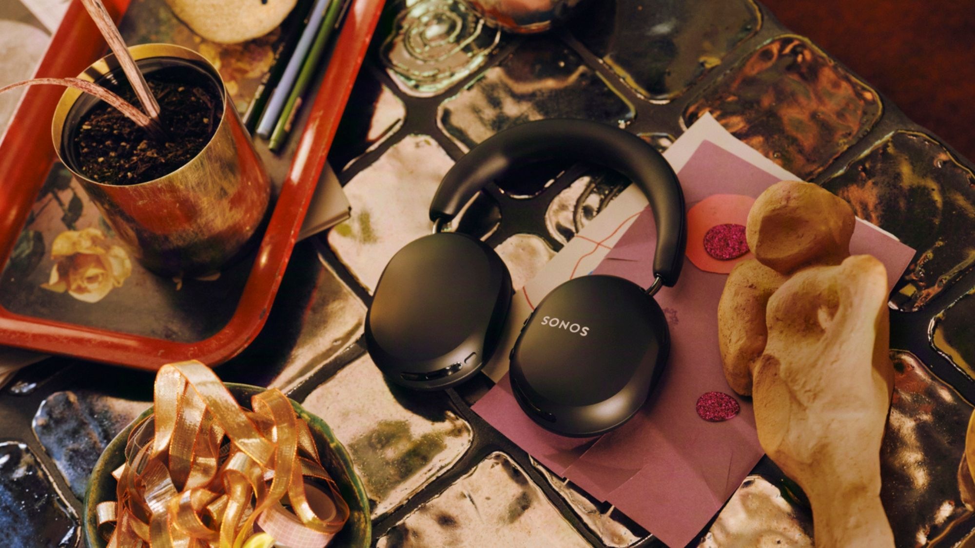 Sonos Ace Ultra headphones on kitchen
