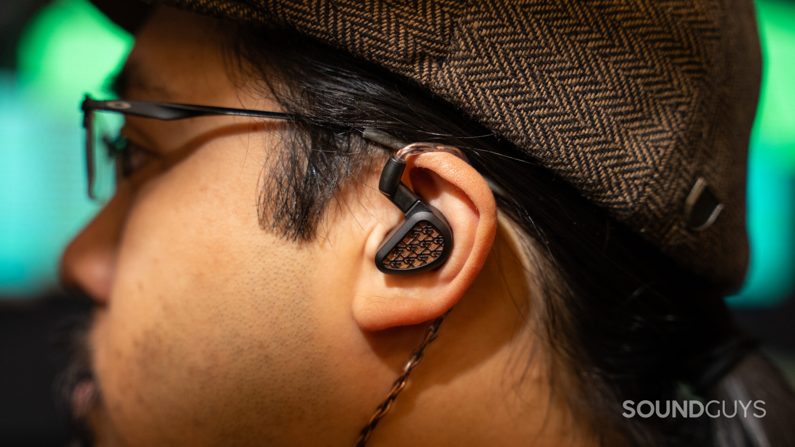 64 Audio Solo worn by man in a cap.