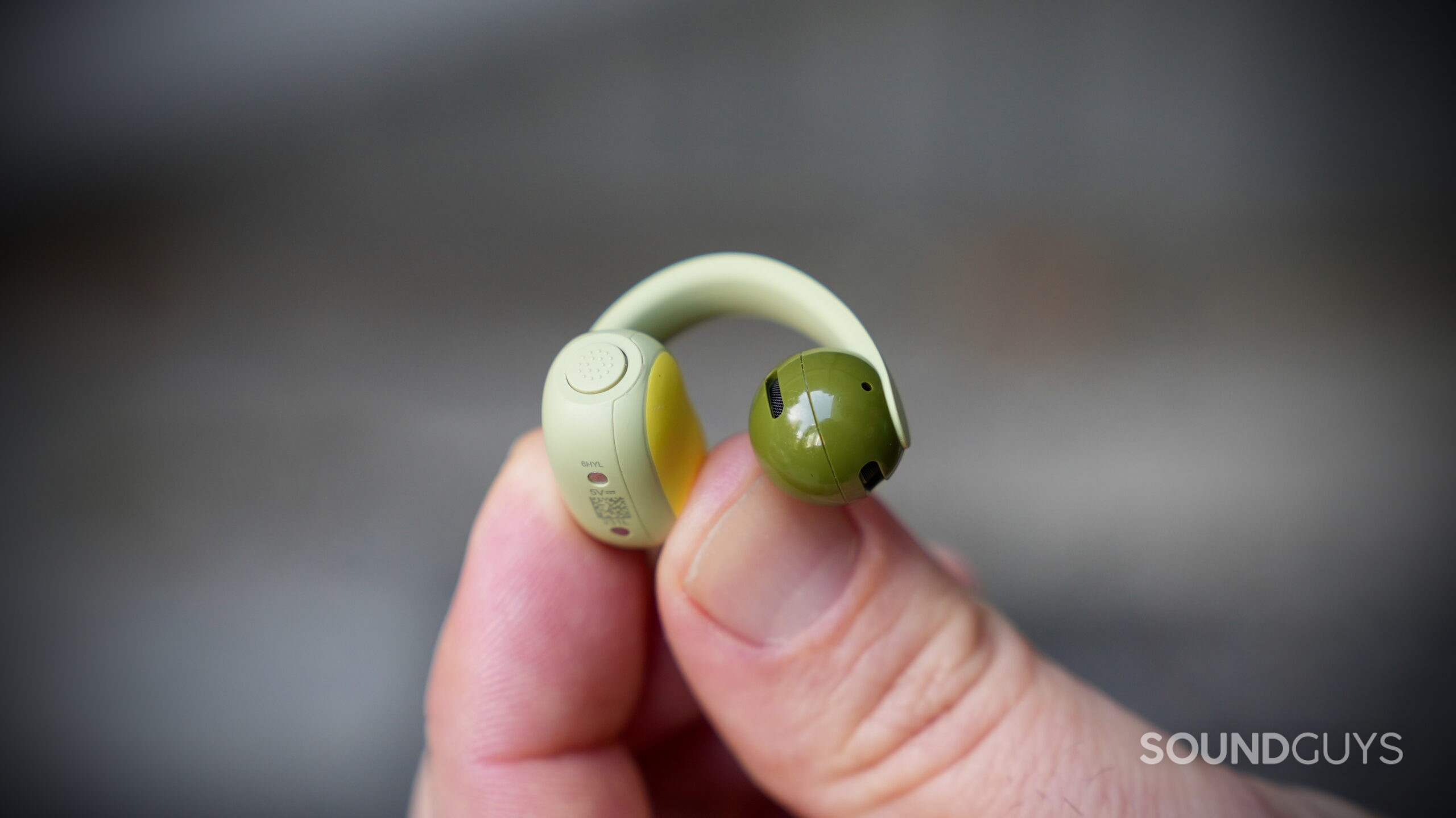 Bose Sport Open Earbuds - 3 (2) Close-up of a Bose Sport Open Earbud showing its flexible cuff and speaker