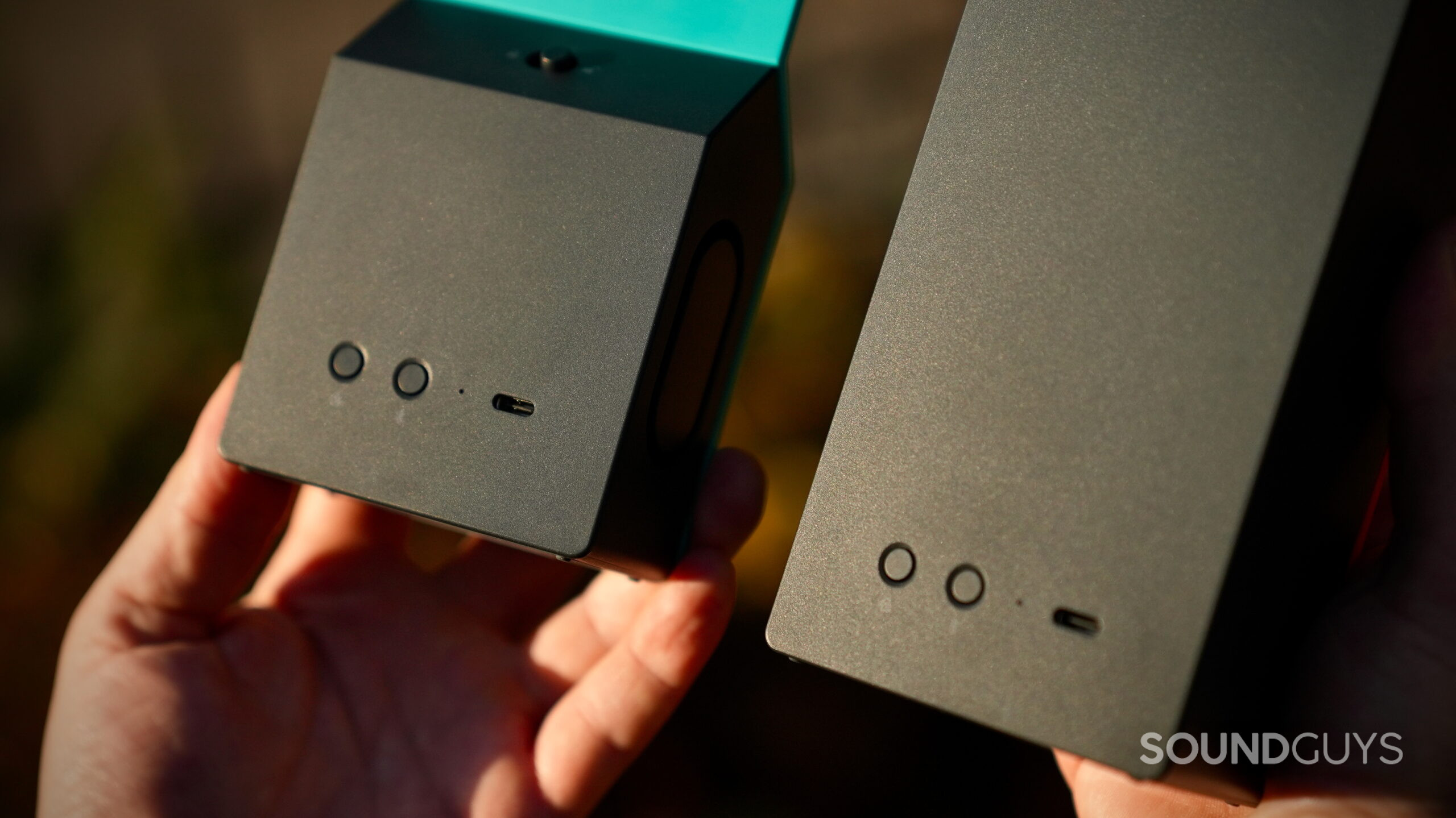 CMF Speaker S and M Edits - 3 Bottom panels of the CMF Speaker S and Speaker M showing two round buttons and a USB-C port on each speaker.