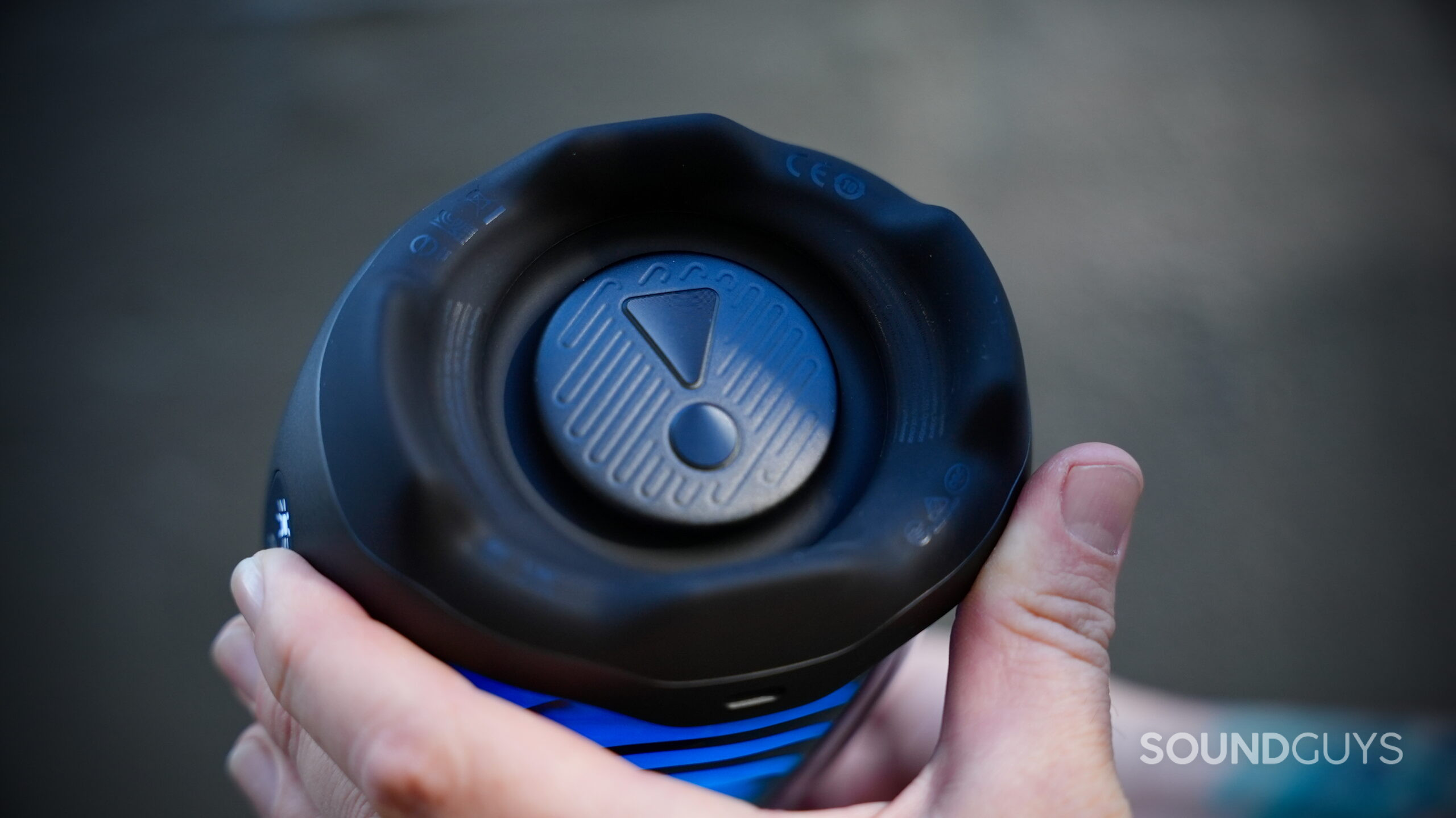 Underside of the JBL Pulse 6 showing its circular rubber base and triangular design.