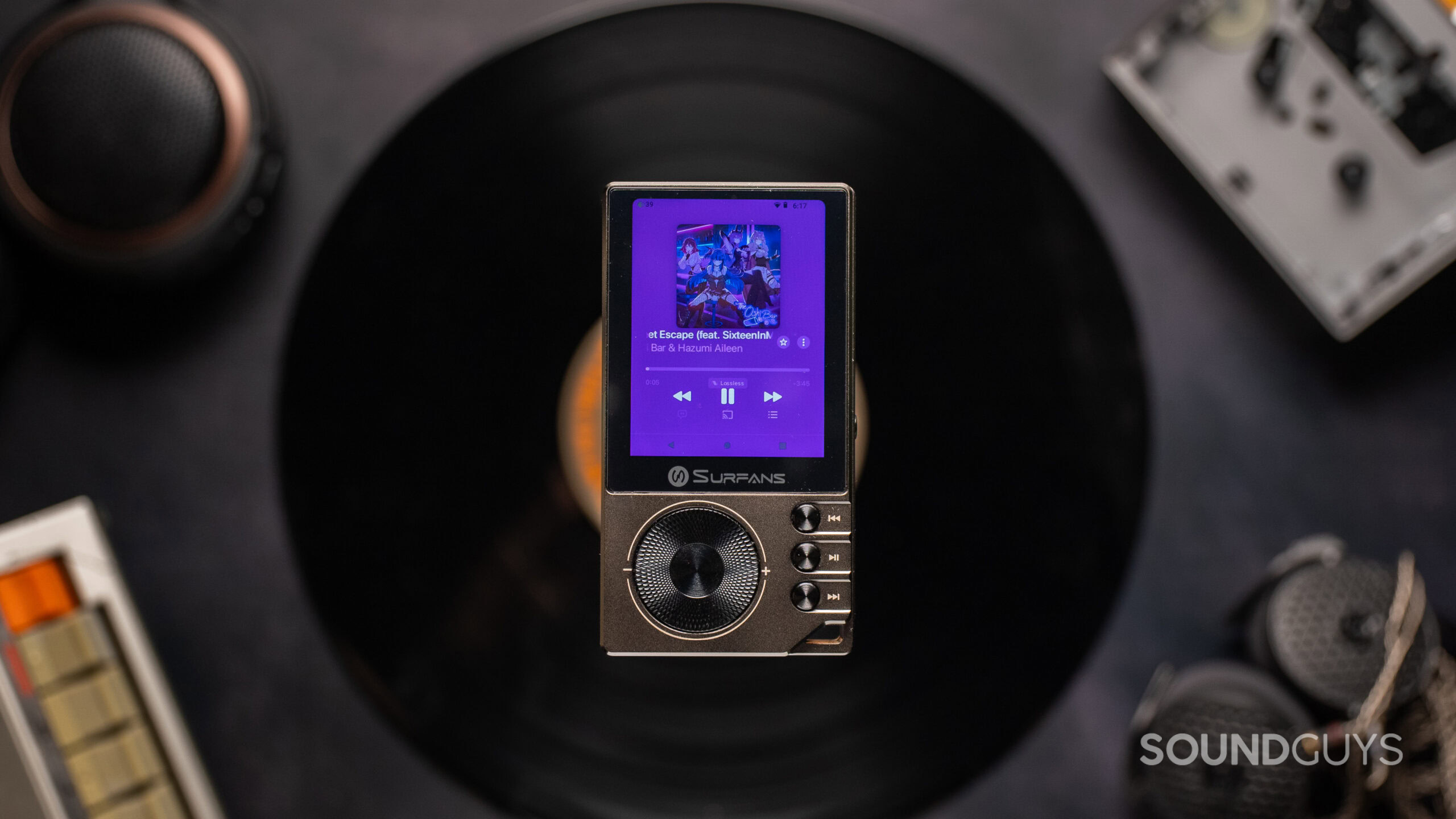 Surfans F20 Pro+ Top Down The Surfans F20 Pro+ media player above a vinyl record.